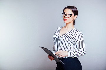 business girl in glasses works in the Office
