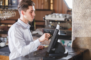 Hand Swiping Credit Card In Store.