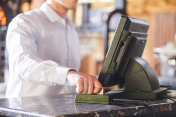Hand Swiping Credit Card In Store.