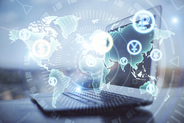 Forex market chart hologram and personal computer background. Double exposure. Concept of investment.