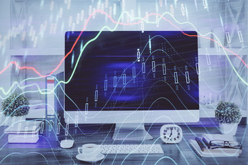 Forex graph hologram on table with computer background. Double exposure. Concept of financial markets.