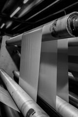 Black & White imagery of spool of plastic packaging sheet heavy duty for industrial use outdoors....