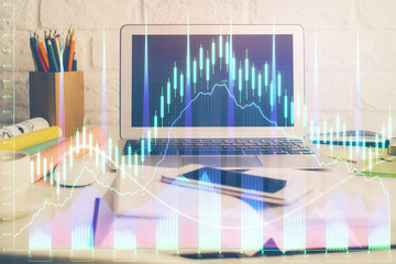 Forex market chart hologram and personal computer background. Double exposure. Concept of investment.
