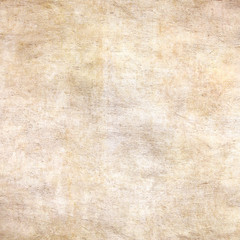 Brown light old grunge paper texture.Vintage rustic wallpaper with a nice patina.
