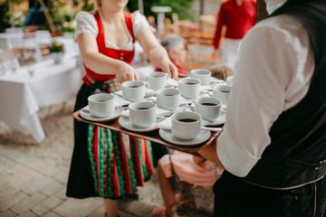 tray with coups of coffee being served at a restaurant 