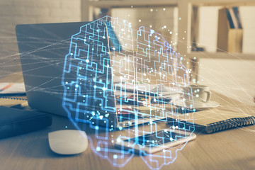 Double exposure of work table with computer and brain sketch hologram. Brainstorming concept.