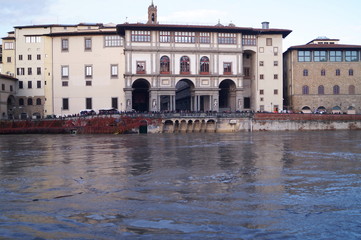 Fototapeta premium The swollen river Arno in Florence, Italy