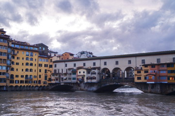 Fototapeta na wymiar The swollen river Arno in Florence, Italy