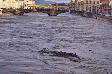 The swollen river Arno in Florence, Italy