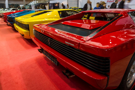 STUTTGART, GERMANY - MARCH 02, 2017: Rear view of various modifications of sports cars Ferrari Testarossa and F512. Europe's greatest classic car exhibition "RETRO CLASSICS"
