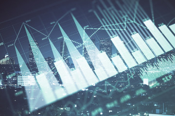 Financial graph on night city scape with tall buildings background multi exposure. Analysis concept.