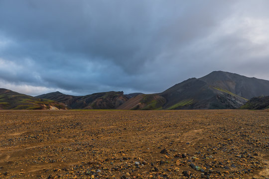 Iceland in september 2019. Great Valley Park Landmannalaugar, surrounded by mountains of rhyolite and unmelted snow. In the valley built large camp. Evening in september 2019