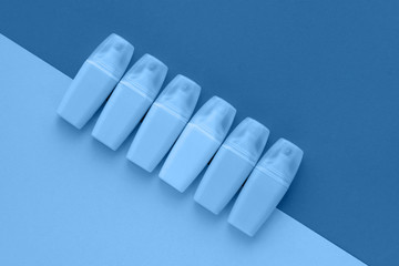 Highlighters set on colored blue background. Flat lay, top view. Trendy color of the year 2020. Back to school, education concept.