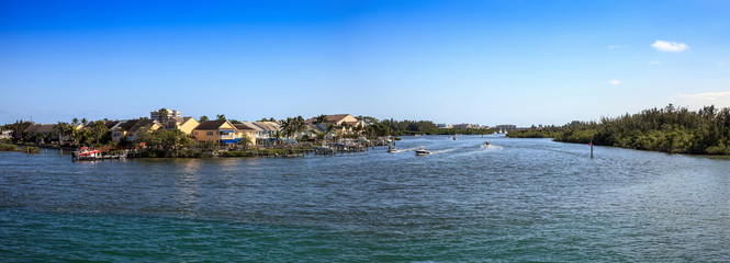 Loxahatchee River with the Jupiter Inlet Lighthouse in the background © SailingAway