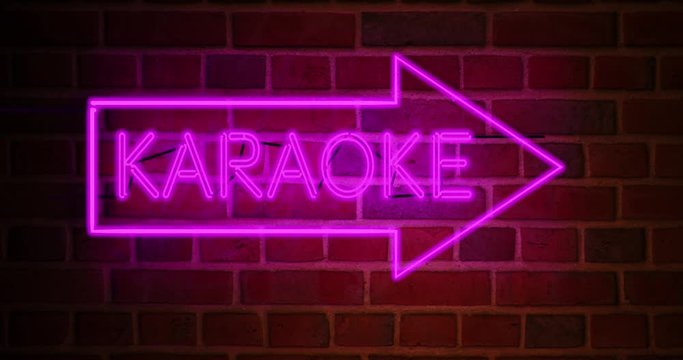 Karaoke neon sign glowing above bar or open mic establishment. Entertainment studio for performing songs or singing - 4k