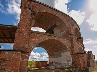 Ancient cast iron cannons, Bomarsund fortress, Sund, Aland Islands, Finland The old ruins of a fortress   Red brick