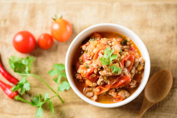 Northern Thai food (Nam Prik Ong), spicy chili minced pork with tomatoes, Thai chili paste 