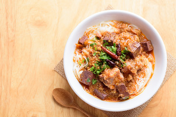 Northern Thai food (Kanom Jeen Nam Ngeaw), rice noodles with spicy soup, top view