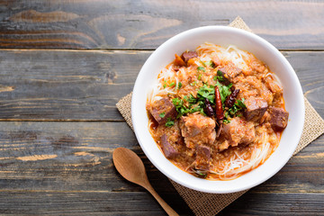 Northern Thai food (Kanom Jeen Nam Ngeaw), rice noodles with spicy soup, top view
