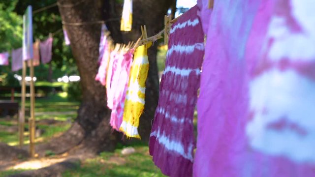 Colorful Abstract tie dyed fabric  hung up to dry.
