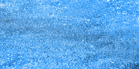 Blue background with blinking stars. Holiday abstract texture.