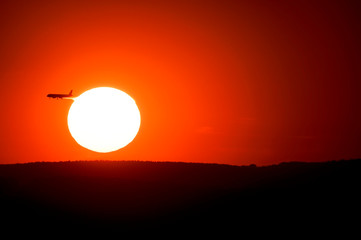 Sunset and plane