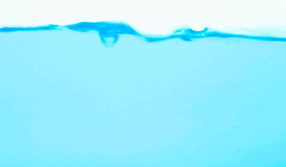Fototapeta na wymiar Blue Water and air bubbles mini wave