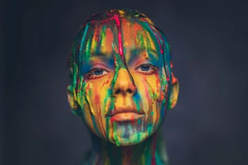 Fototapete Rund Young woman covered with a colourful paint © Nejron Photo