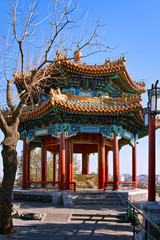 Pavilion of Gathering Fragrance in Jingshan Park. octagonal two-tiered pointed roof. traditional...
