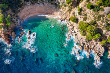 Sea Aerial view. Top view, nature background. Azure sea beach with rocky mountains and clear water at sunny day. Flying drone. Tropical trees. - 307864690