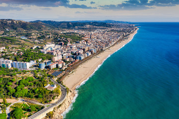 Pineda de Mar. Catalonia, Spain. Aerial view. Resort town, Mediterranean Sea, sunset.