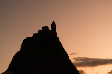 castle and church at sunset