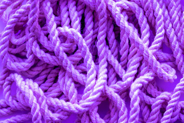 Rope closeup on lilac background isolated texture abstract