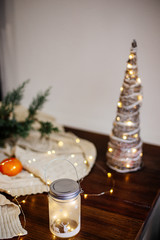 Christmas lights in a glass.