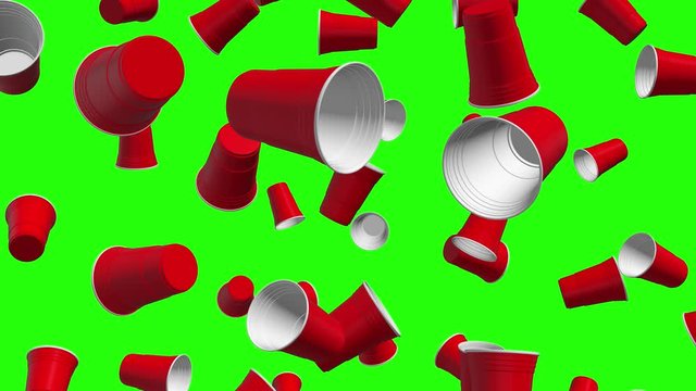 Rain of 3d Red Plastic Cups falling on green screen background. Disposable drinking cup on chroma key. Close up view. It's party time concept. 4k animation.