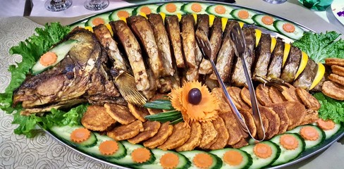 famous carp from lake prespa, macedonia,fish sliced served for eating