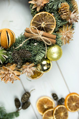 Fototapeta na wymiar New year christmas decoration with spices, cinnamon, mandarin, eve on white wooden background