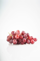 Ripe red grape isolated on white background. Vertical