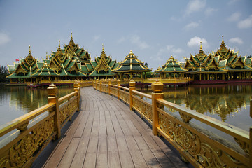 Obraz premium Beautiful bridge over the pond to the gazebos. Bangkok. The ancient city - Muang Boran