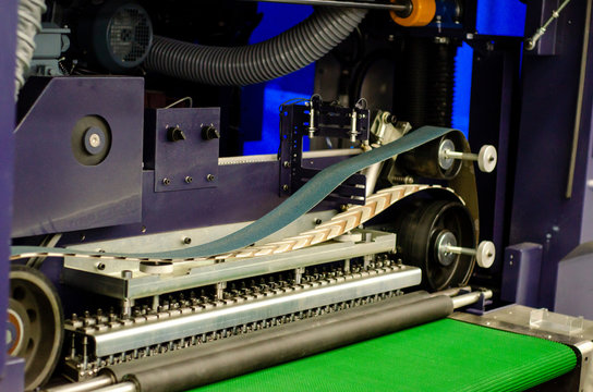 Close-up of industrial belt sander machine