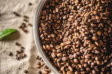 Pile of freshly roasted aromatic Arabica coffee beans. Coffee background with space for text