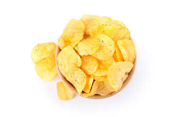 Potato chips in a bowl isolated on white background, space for text. Top view