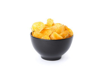 Potato chips in a black bowl isolated on white background, space for text