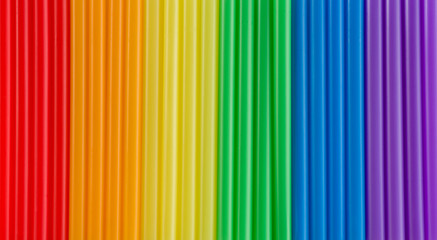 Obraz premium Colourful pipette tubes with rainbow colours. lgbtq+ symbol