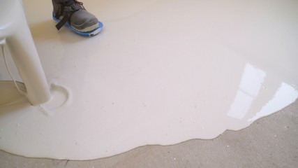 Workers apply a polymer waterproofing form of memory.