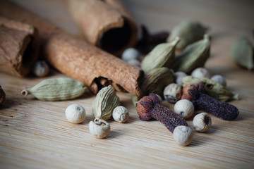 Spices and herbs over wooden table