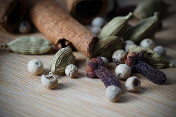 Spices and herbs over wooden table