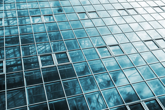 glass roof of a modern building, with metal floors and frame. Toned image