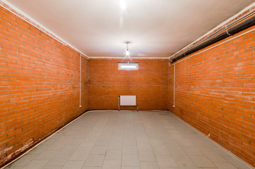 Russia, Omsk- August 02, 2019: interior room empty basement with brick walls