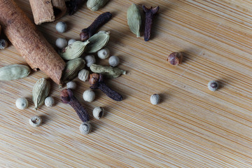 Spices over wooden background